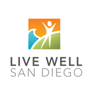 Logo with an abstract figure standing on a green hill, a blue wave, and an orange sky. Below the image, the words Live Well San Diego are written in gray capital letters.